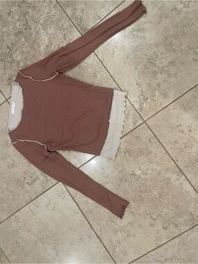 Lush Mauve Ribbed Long-Sleeve Top with Cream Trim